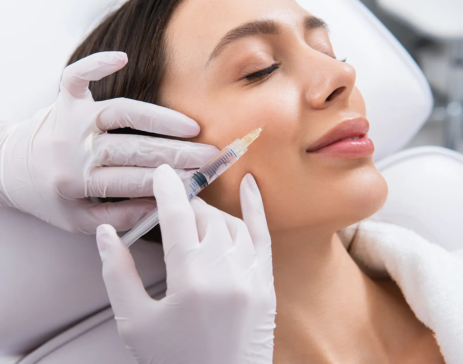 Lip and cheek filler showing natural-looking enhancement — Empowered Plastic Surgery, Sugar Land TX